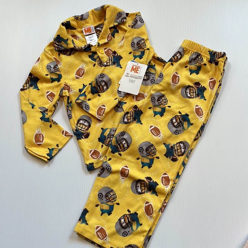Minions yellow football pajama top & bottoms.  Size 4